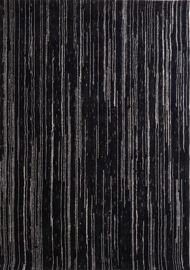 alfombra de lana color negro y gris jaspeado